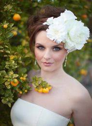свадебные прически с цветами фото свадебные прически с цветами фото